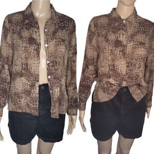 Petite Sophisticate animal print long sleeve silk button down casual shirt.